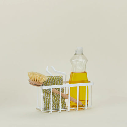 Golden Linen Hanging Sponge Caddy attached to kitchen faucet