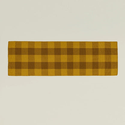Golden Linen Simple Plaid Runner Rug in Mustard/Bronze on a hallway floor