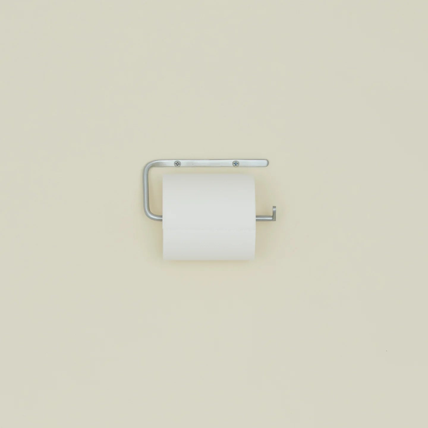 Golden Linen Zinc Plated Toilet Paper Holder in polished silver for modern bathroom